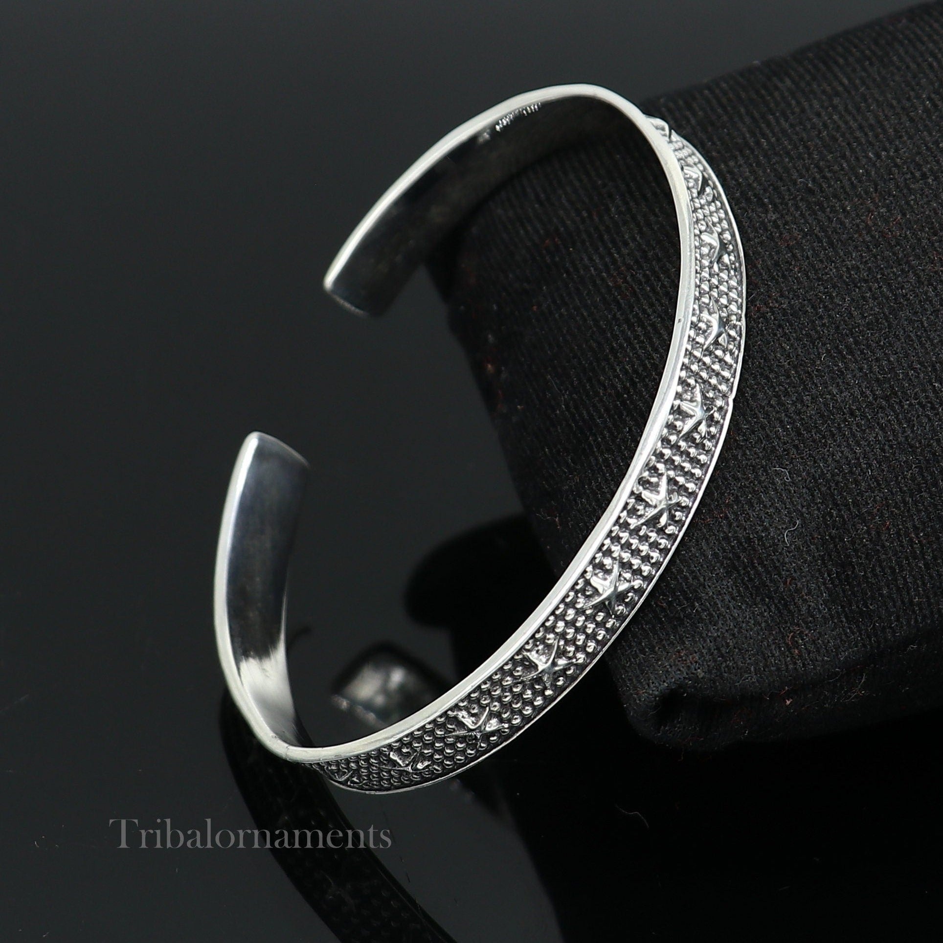 925 sterling silver open face cuff bracelet by Tribal Ornaments, adjustable handmade jewelry with tribal design and elegant craftsmanship.