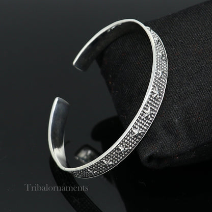925 sterling silver open face cuff bracelet by Tribal Ornaments, adjustable handmade jewelry with tribal design and elegant craftsmanship.