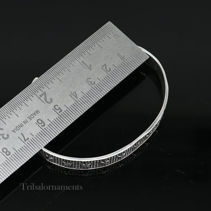Sterling silver open face cuff bangle bracelet by TRIBAL ORNAMENTS, adjustable handmade jewelry from India.