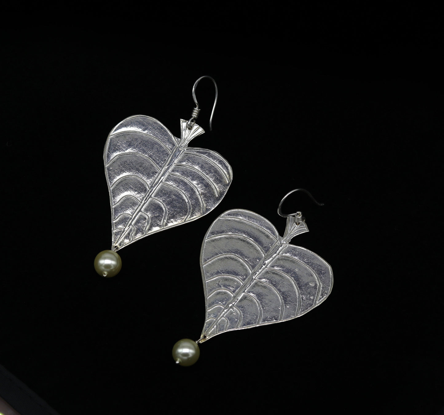 Sterling silver handmade peepal tree leaf earring with hanging pearl, customized hoops, part of Tribal Ornaments summer collection.