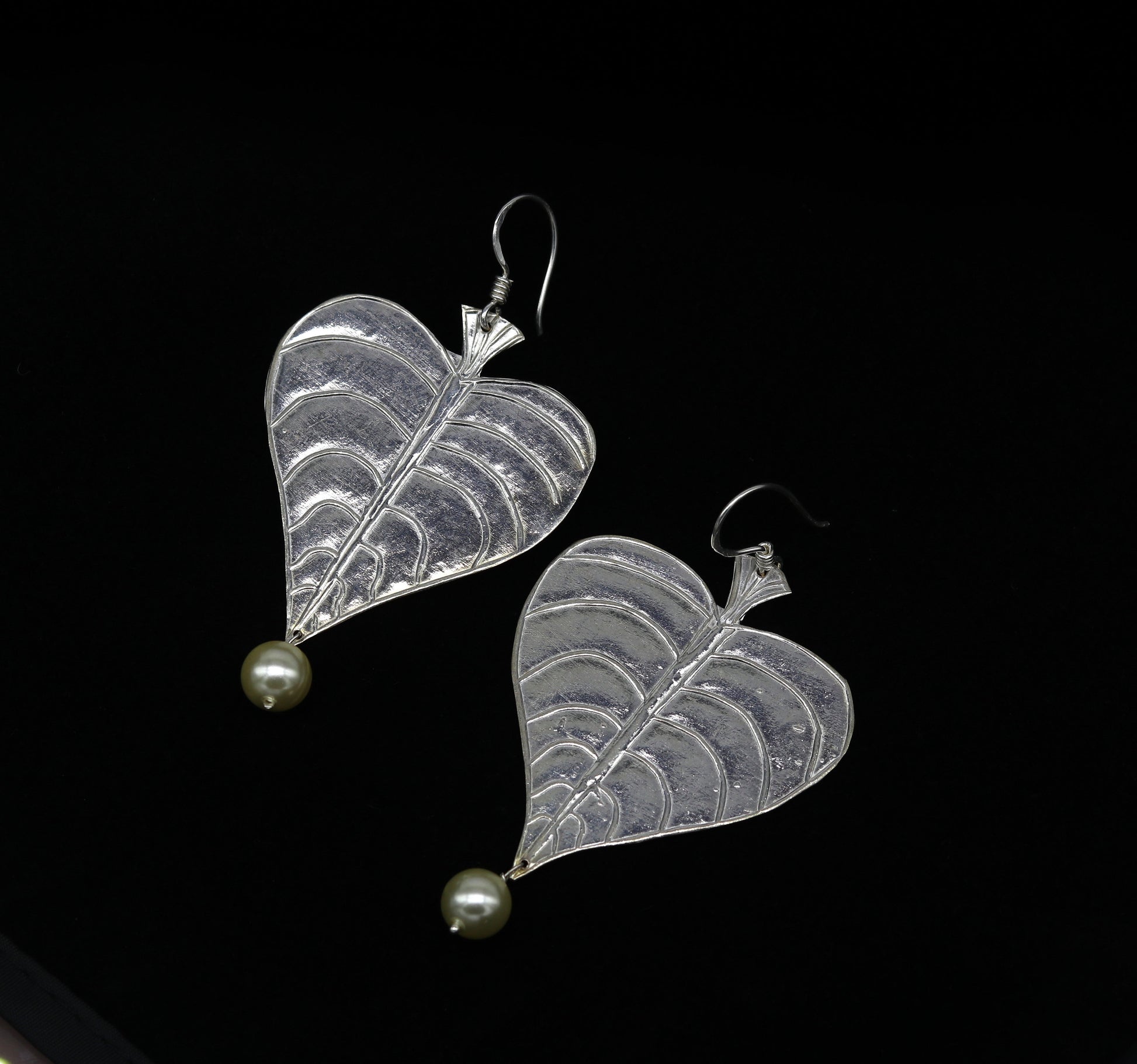 Sterling silver handmade peepal tree leaf earring with hanging pearl, customized hoops, part of Tribal Ornaments summer collection.