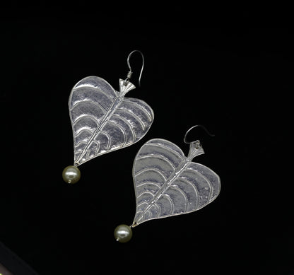Sterling silver handmade peepal tree leaf earring with hanging pearl, customized hoops, part of Tribal Ornaments summer collection.