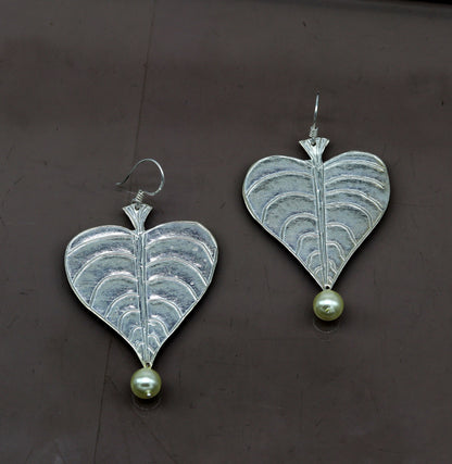 Sterling silver handmade peepal tree leaf earring with hanging pearl, custom hoop design from Tribal Ornaments summer collection.