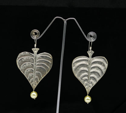 Sterling silver handmade peepal tree leaf earring with hanging pearl, stylish hoop design from Tribal Ornaments summer collection.