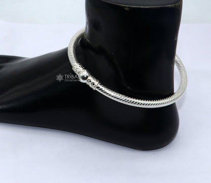 Sterling silver handmade Indian traditional women's foot and ankle kada bracelet with plain design and tribal jewelry style.