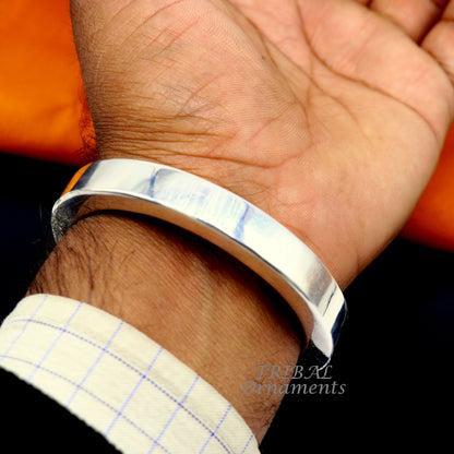 Sterling silver handmade bangle bracelet from TRIBAL ORNAMENTS, plain shine finish, unisex jewelry, perfect for personalized gifting.