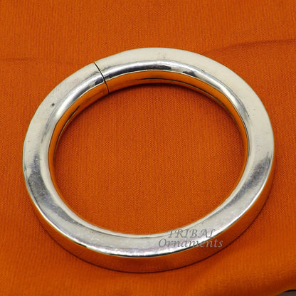 Sterling silver handmade bangle bracelet with a shiny, plain design, unisex jewelry perfect for personalized gifting by Tribal Ornaments.