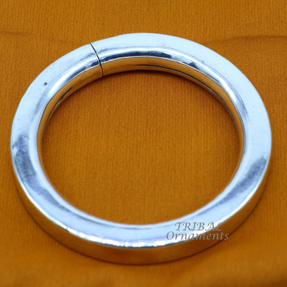 Sterling silver handmade bangle bracelet with a plain shine finish, unisex design, ideal for personalized gifting by Tribal Ornaments.