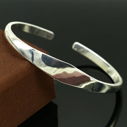 Sterling silver adjustable bangle cuff from TRIBAL ORNAMENTS with a plain shine design and personalized jewelry style.