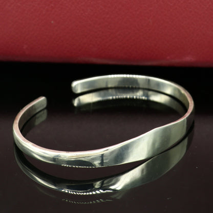 Sterling silver adjustable bangle bracelet with plain shine design, handcrafted by TRIBAL ORNAMENTS, featuring personalized jewelry style.