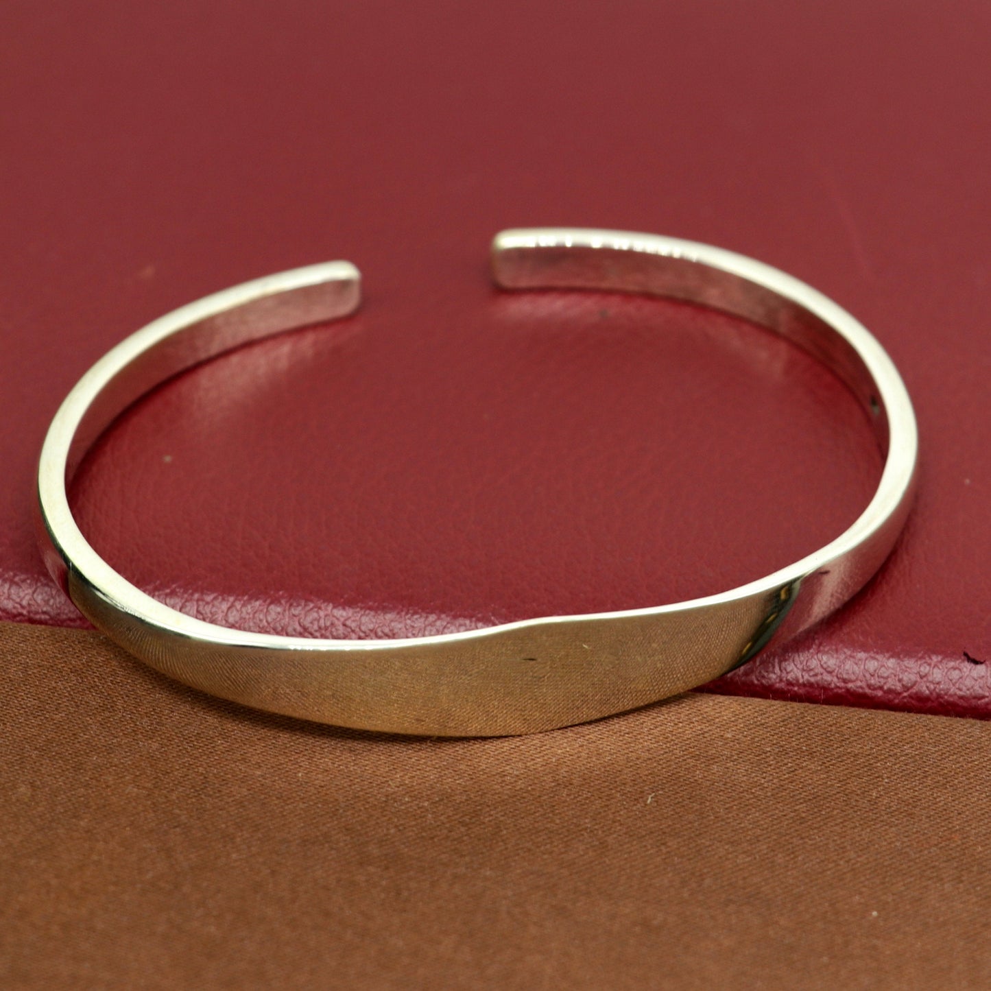 Sterling silver handmade adjustable bangle bracelet with plain shine design, featuring a unique and personalized Indian kada cuff.