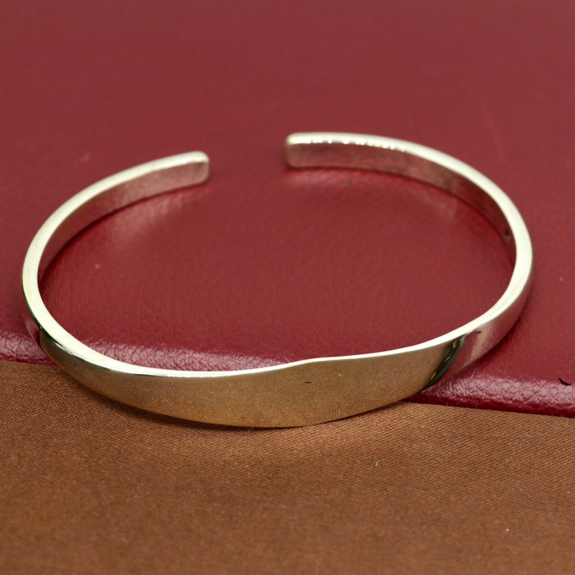 Sterling silver handmade adjustable bangle bracelet with plain shine design, featuring a unique and personalized Indian kada cuff.