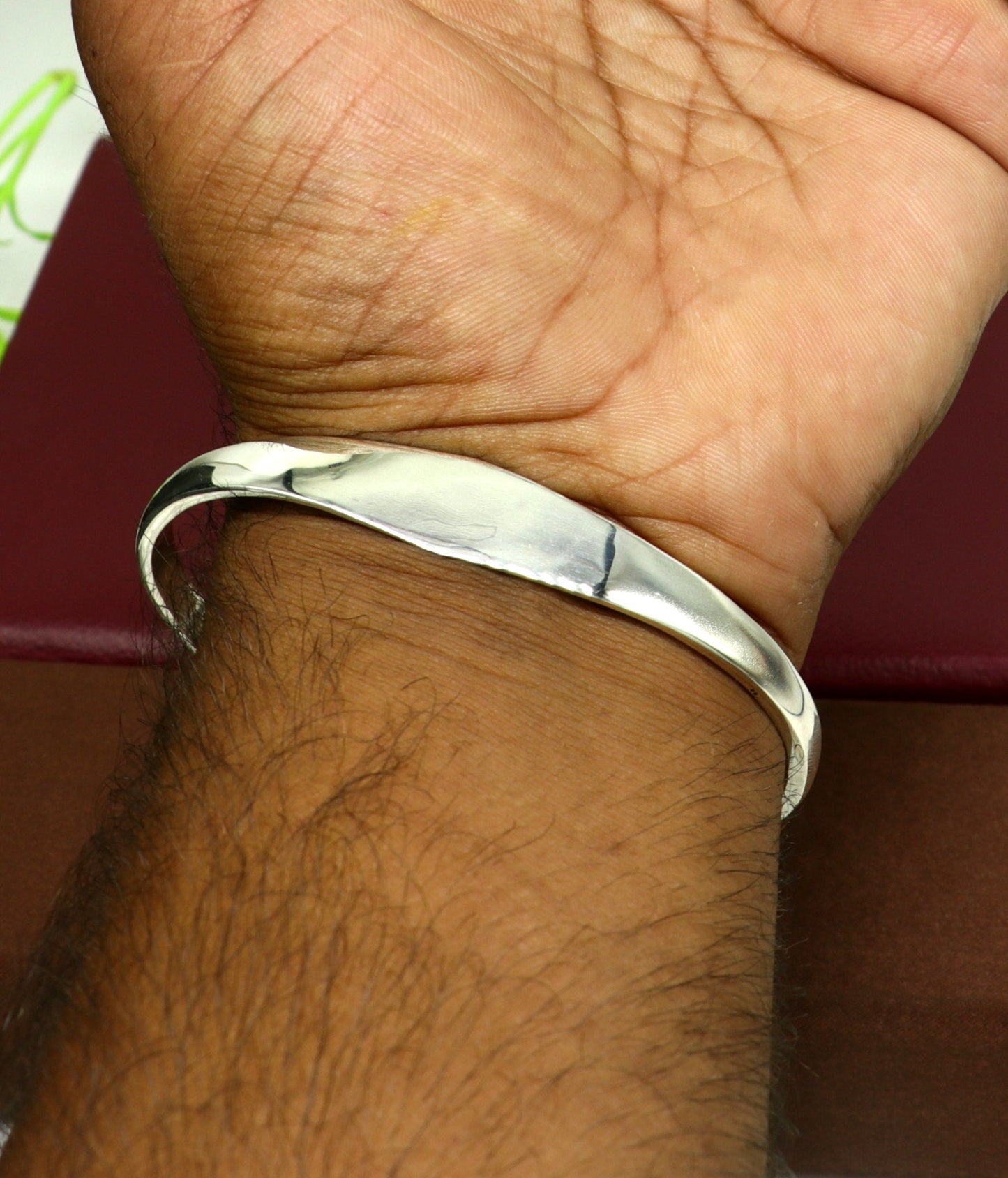 Sterling silver adjustable bangle bracelet with a plain shine design, handcrafted by TRIBAL ORNAMENTS, from India.