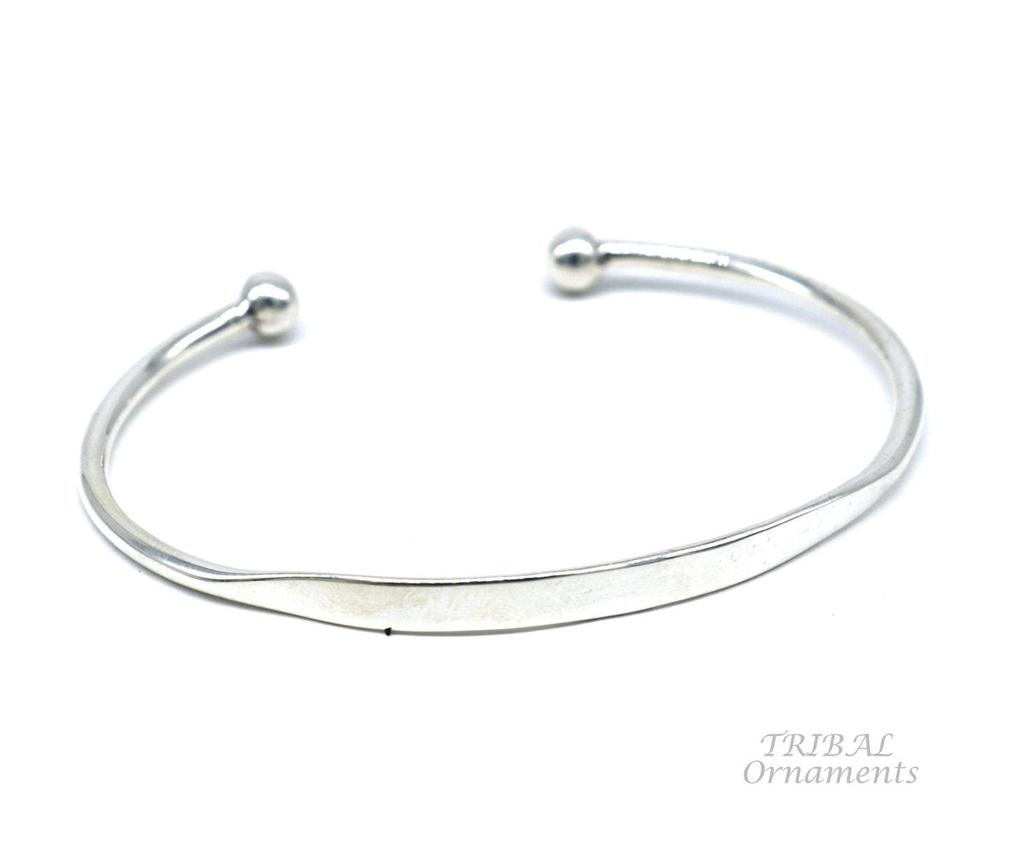 Sterling silver handmade bangle bracelet with shiny, plain design, stylish cuff or kada bracelet by Tribal Ornaments.