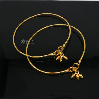Sterling silver handmade foot bracelet with shiny gold polish, designed for ankle, belly dance, and decorative jewelry.