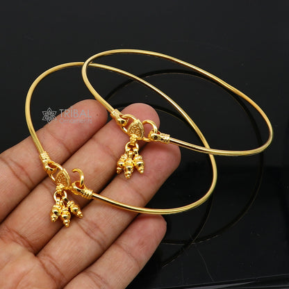 Sterling silver handmade foot bracelet with shiny gold polish, featuring a sleek design for ankle and belly dance jewelry.