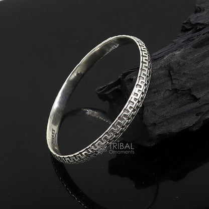 Sterling silver Punjabis Shikha unisex kada bracelet by TRIBAL ORNAMENTS, featuring intricate handmade designer silver jewelry.