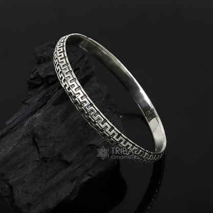 Sterling silver Punjabis shikha unisex kada bracelet by Tribal Ornaments, featuring intricate handmade designer craftsmanship.