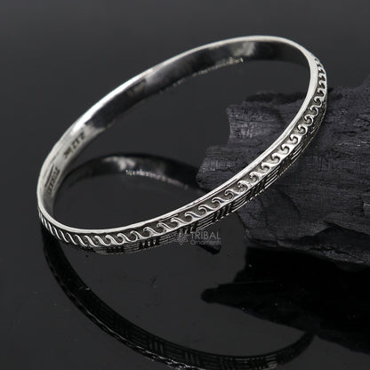 Sterling silver Punjabis shikha unisex kada bracelet by Tribal Ornaments, featuring intricate handmade designer jewelry design.