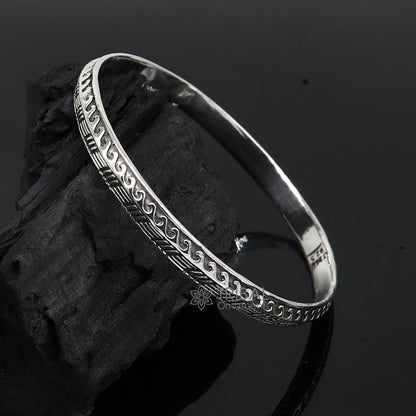 Sterling silver Punjabis shikha unisex kada bracelet by Tribal Ornaments, featuring intricate handmade designer bracelet design.