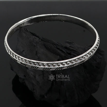 Sterling silver Punjabis Shikha unisex kada bracelet by TRIBAL ORNAMENTS, featuring intricate designer craftsmanship and delicate detailing.