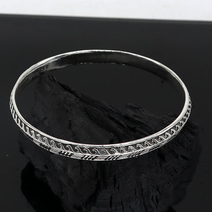 Sterling silver Punjabis Shikha unisex kada bracelet by Tribal Ornaments featuring intricate designer craftsmanship.