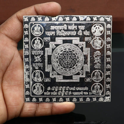 925 sterling silver handmade Shree Ashthlakshmi Yantra for wealth and prosperity, detailed religious ornament by Tribal Ornaments