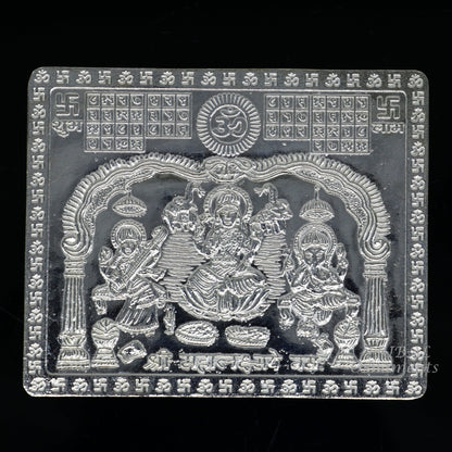 925 silver Shree Mahalakshmi frame with Ganesha and Saraswati, handmade divine article for wealth and prosperity by TRIBAL ORNAMENTS