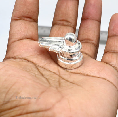 Small handmade 925 sterling silver Lord Shiva lingam, traditional shivling for home temple puja and spiritual rituals.