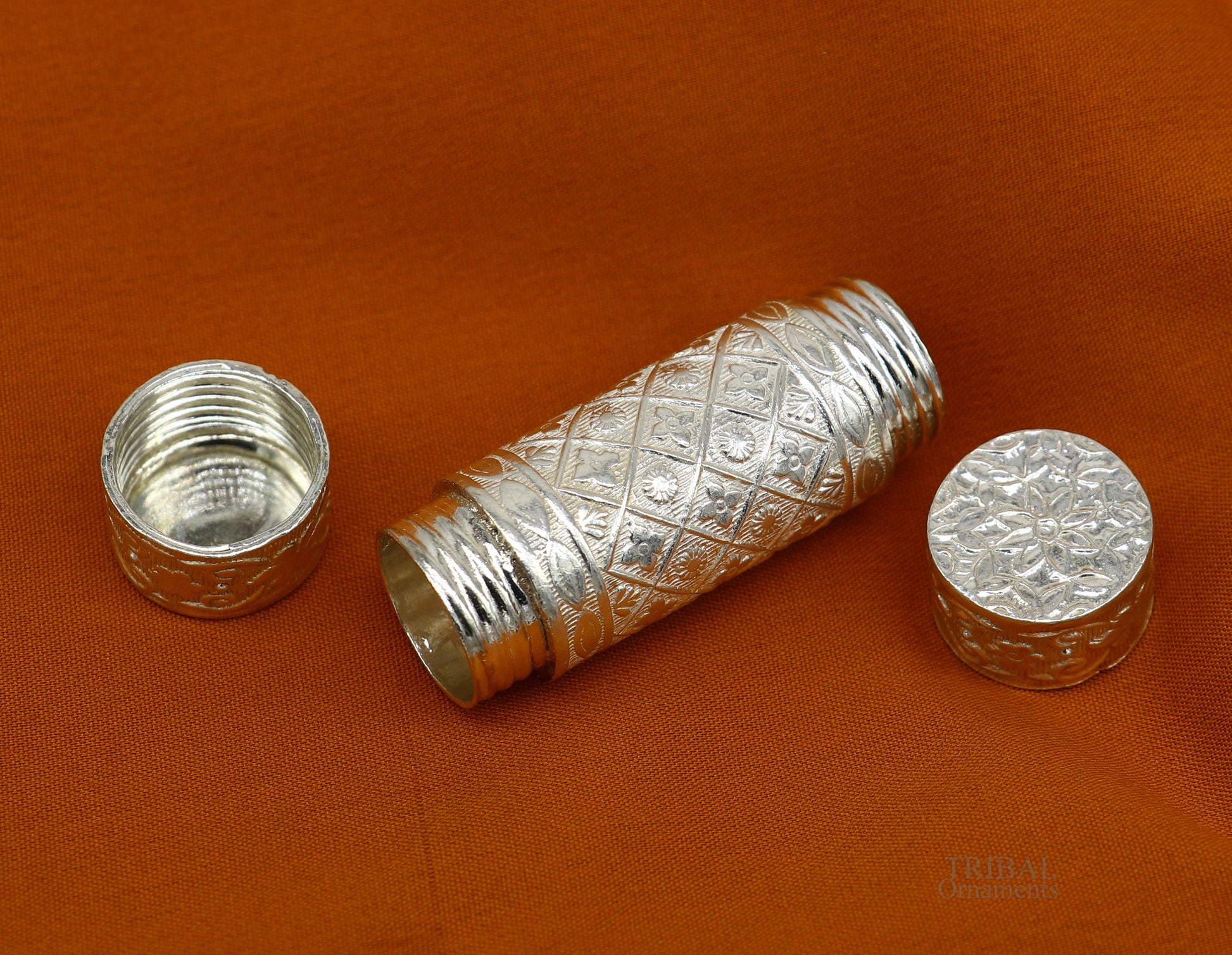 Sterling silver handmade small pill and tobacco box by TRIBAL ORNAMENTS, featuring intricate silver utensils and compact personal storage.