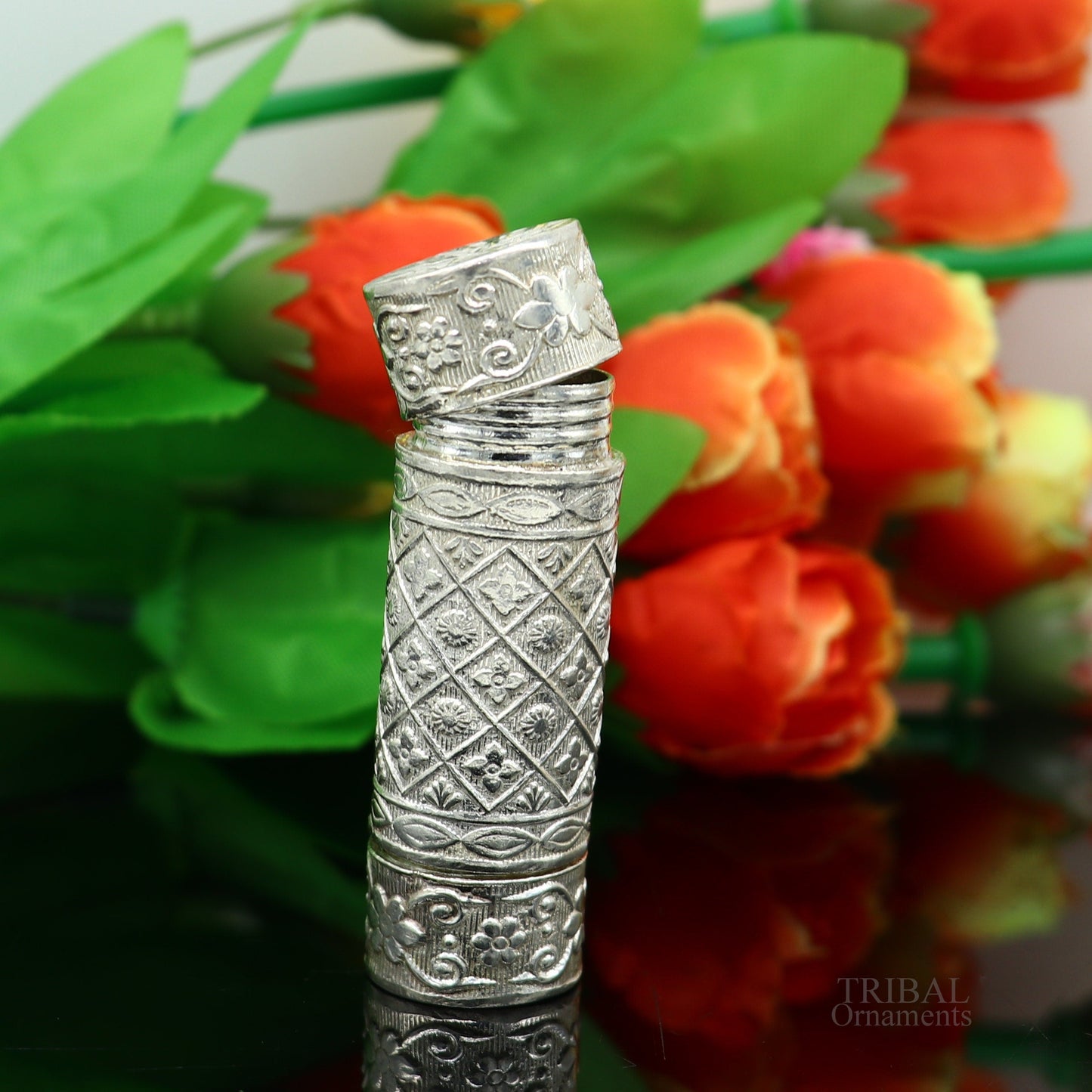 925 sterling silver handmade small pill box with tribal ornament design, used as a tobacco or personal storage box for men's accessories.