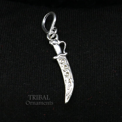 Sterling silver tiny sword pendant by Tribal Ornaments, handcrafted talwat knife design for protection against negative energy.