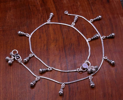 Sterling silver handmade snake chain anklet with charms, dainty foot jewelry perfect for gifting or belly dance accessories.