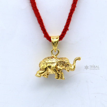 925 sterling silver elephant pendant by TRIBAL ORNAMENTS, gold polished handmade jewelry featuring a small, detailed elephant design.