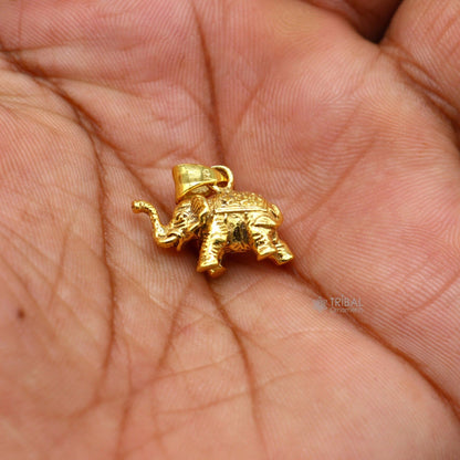 925 sterling silver elephant pendant with gold polish, handmade tribal jewelry, showcasing intricate design and lucky charm details.