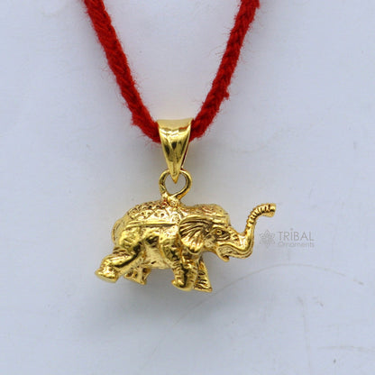 925 sterling silver elephant pendant with gold polish, handmade tribal jewelry, featuring a small, detailed lucky elephant design.