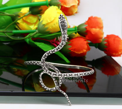 925 sterling silver snake design bangle cuff from TRIBAL ORNAMENTS, featuring a detailed cobra motif for unisex jewelry style.