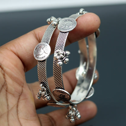 Sterling silver Victoria Empress coin design bangles bracelet by TRIBAL ORNAMENTS, handmade tribal jewelry for brides and special occasions.