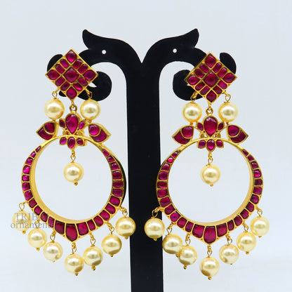 Sterling silver handmade Chandbali earrings with gold plating, hanging pearl detail, stylish design, perfect for gifting.