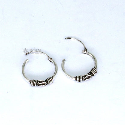 Handmade 925 sterling silver traditional cultural hoops earrings from Bali, featuring intricate tribal ethnic jewelry design.