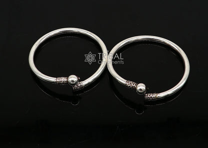 Sterling silver tribal-inspired kada bracelet for men and girls, featuring cultural design and lightweight craftsmanship.