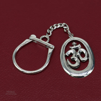 925 Sterling silver OM Aum mantra key chain by TRIBAL ORNAMENTS, handcrafted unisex silver accessory with stylish design.