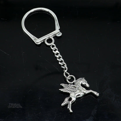 Sterling silver handmade unicorn horse keychain by TRIBAL ORNAMENTS, featuring a unique, solid design and stylish royal-inspired details.