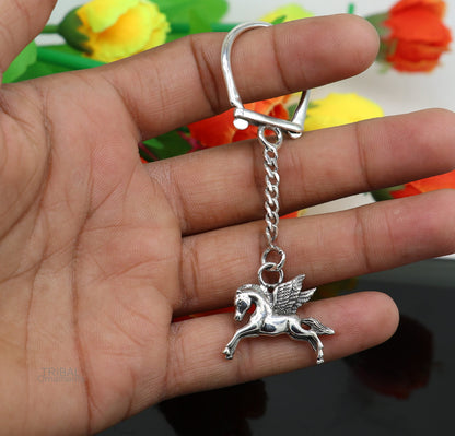 Sterling silver handmade unicorn horse design key chain by TRIBAL ORNAMENTS, stylish unisex jewelry accessory with intricate details.