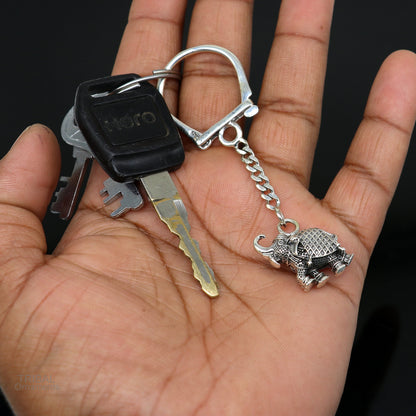 Sterling silver vintage elephant design keychain by TRIBAL ORNAMENTS, handcrafted with intricate tribal ornament details.