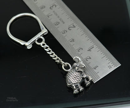 Sterling silver vintage elephant design key chain by TRIBAL ORNAMENTS, featuring intricate handmade tribal elephant artwork.
