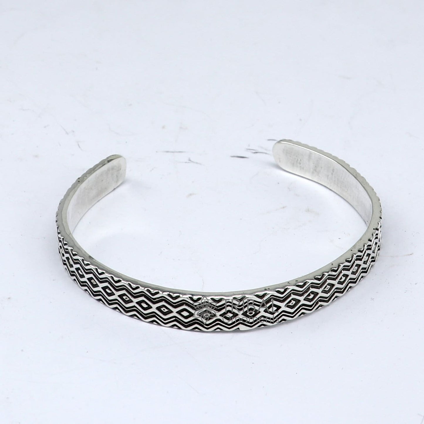 Sterling silver handmade zig zag cuff bracelet by Tribal Ornaments, adjustable unisex jewelry with unique solid silver design.