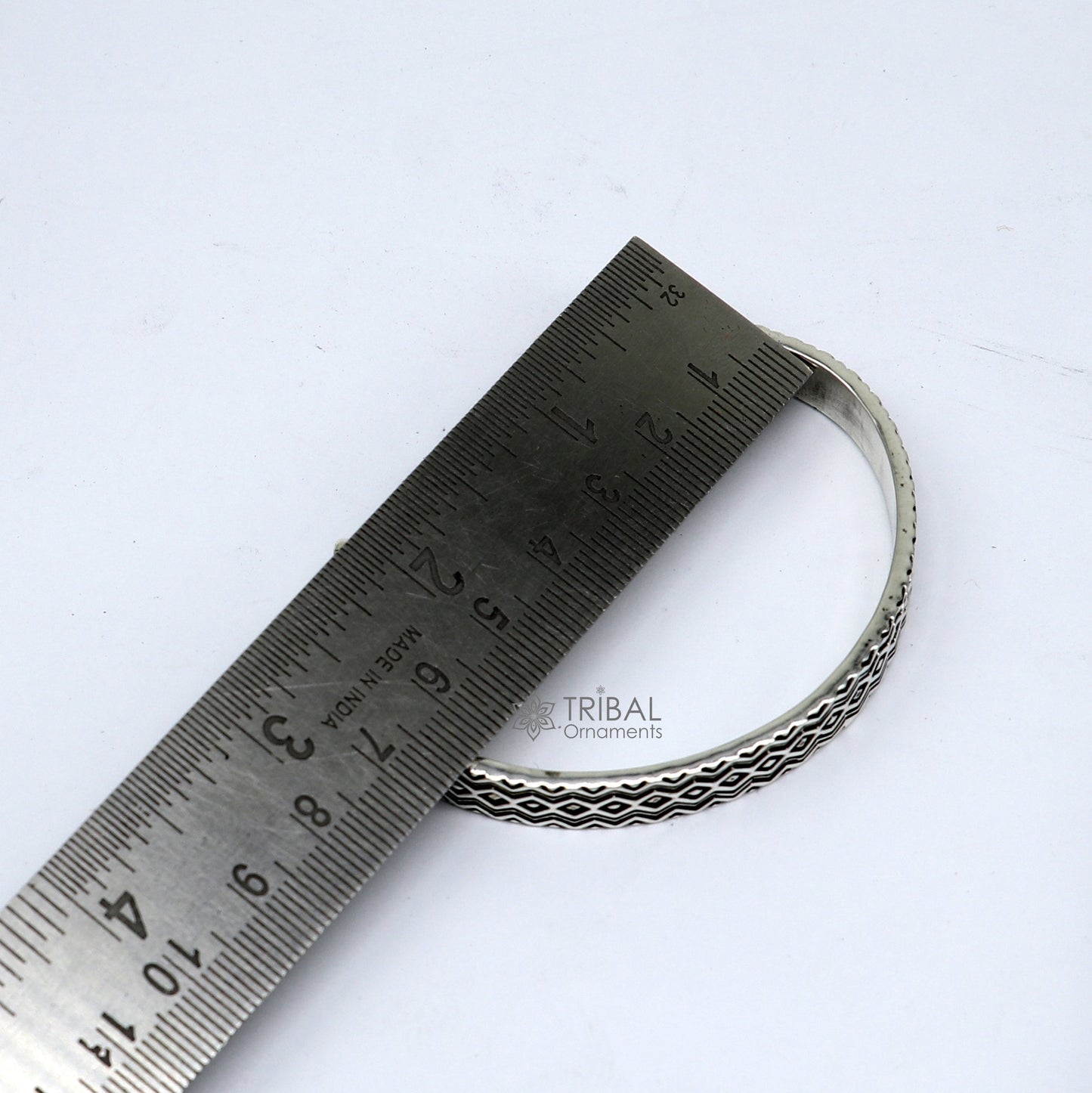 Sterling silver handmade zig zag cuff bracelet by TRIBAL ORNAMENTS, adjustable unisex solid silver jewelry with unique design.