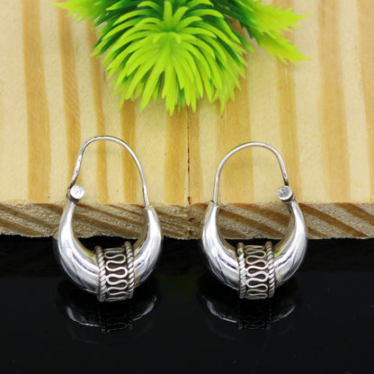 Sterling silver handmade vintage hoop earrings with tribal and ethnic design, crafted by TRIBAL ORNAMENTS.