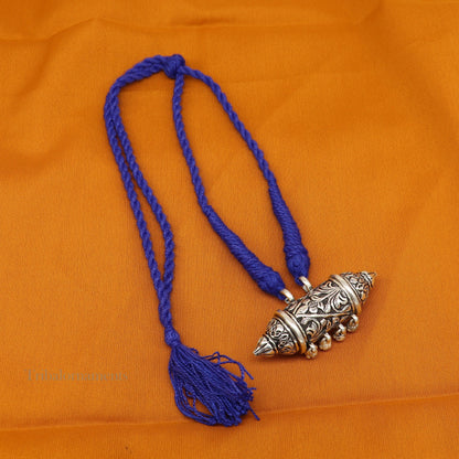 Sterling silver handmade vintage tribal pendant with bells from Rajasthan, India, featuring intricate antique design and hanging embellishments.
